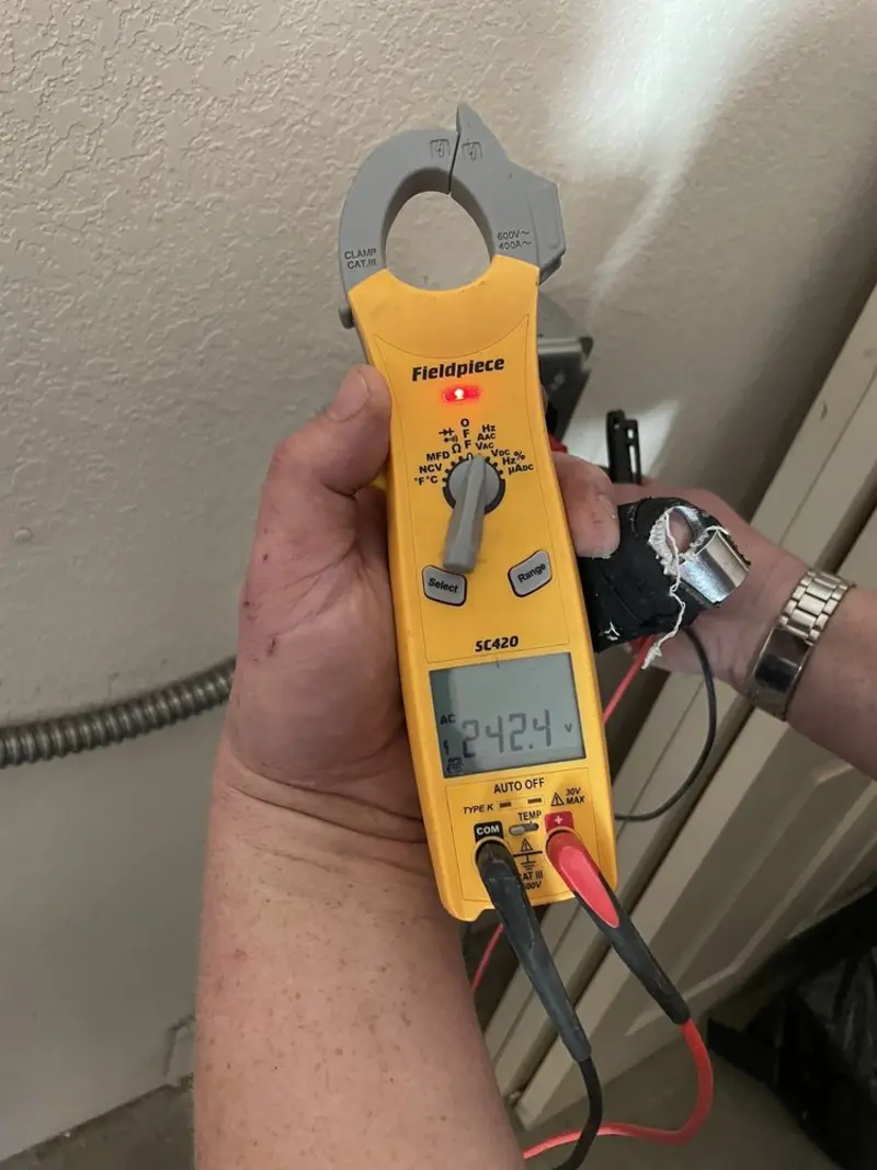 Voltage testing with clamp meter during Electrical Installation Services in Birdsboro